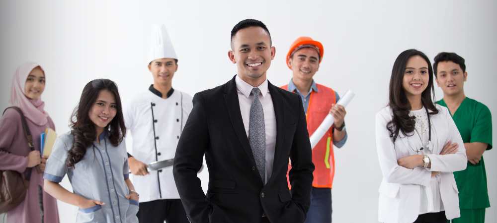 Personen in Arbeitskleidung